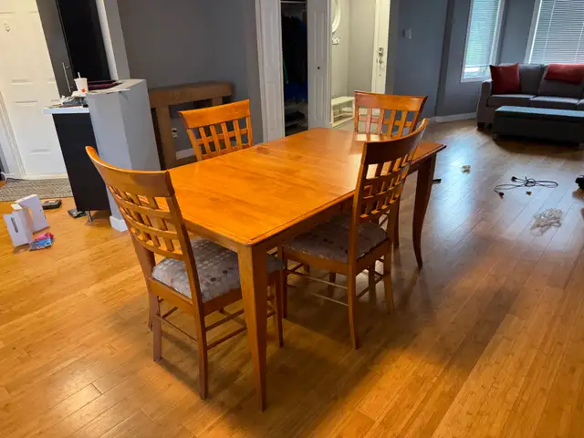 Solid maple dining table with 4 maple chairs $500