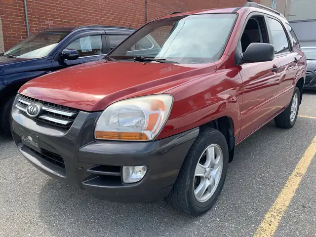 130000 KM Kia sportage auto A/C démarreur Bluetooth