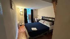 FULLY FURNISHED ONE BEDROOM UNIT WITH A DEN