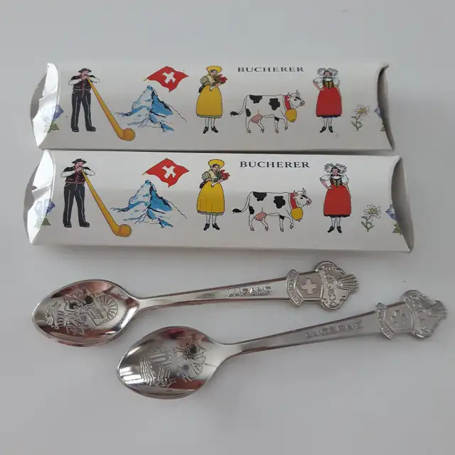 2PETITES CUILLÈRES NEUVES DE LA SUISSE 14'DE LONG: $5.00 CHACUNE