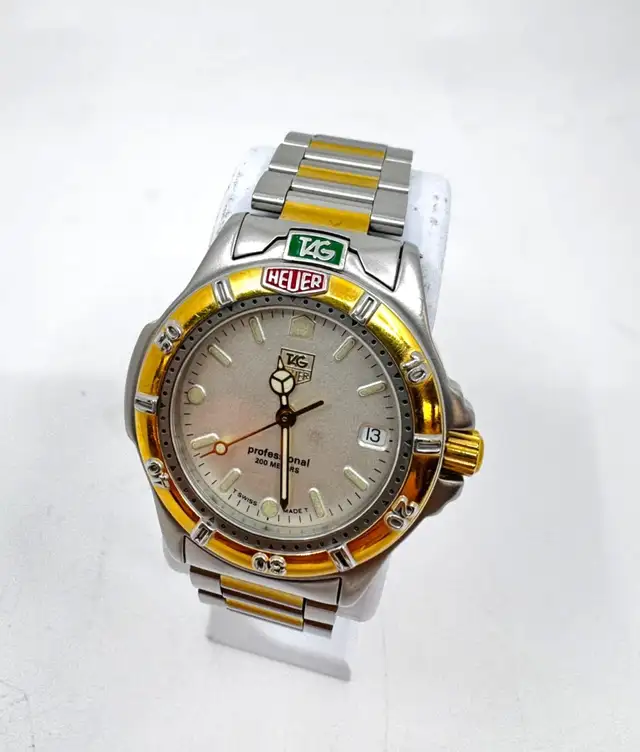 TAG Heuer Professional 995.713A Two-Tone Quartz Watch–200M $399