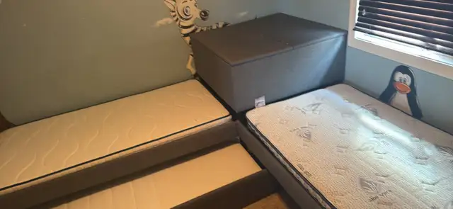 twin bed (three bed set up) with two mattresses