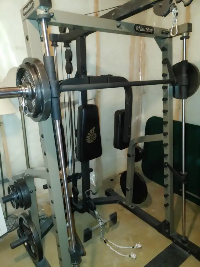 Nautilus Smith Machine with Dumbell set
