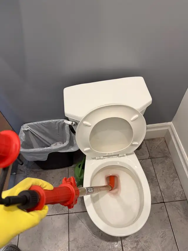 Unclogging Toilet