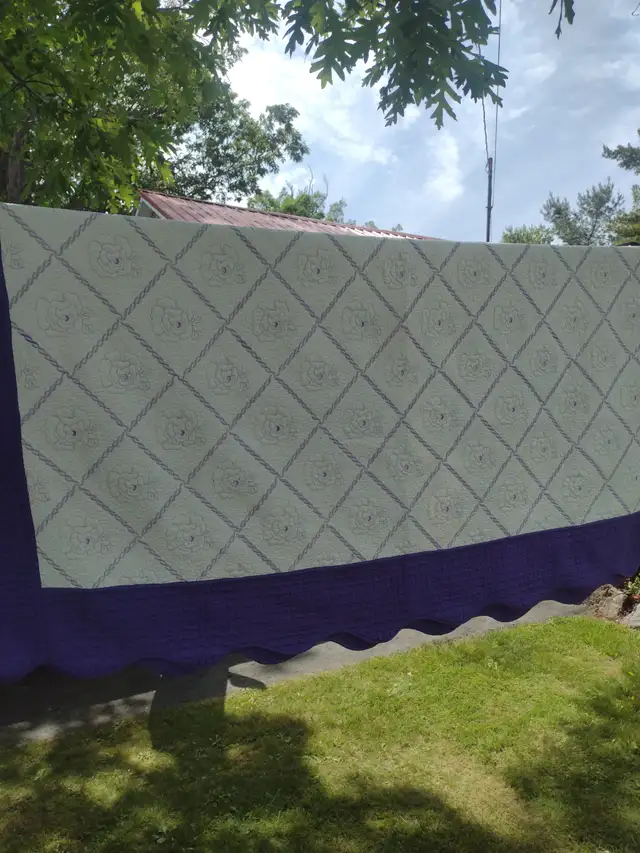 Lavender quilt with flowers 92 x 95 reversible