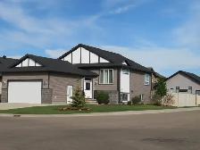 Double Car Garage and Main Floor Home in Upscale Vanier Woods