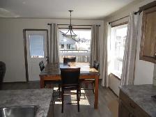 Double Car Garage and Main Floor Home in Upscale Vanier Woods - Photo 2