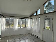Country 2 bedroom home with beautiful sunroom for rent. - Photo 7