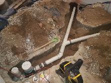 DRAIN SNAKE ROUGH IN WASHROOM SUMP PUMP ISSUE WATERPROOFING WET - Photo 2
