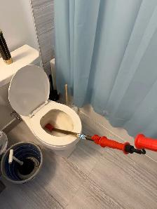 Unclogging Toilet