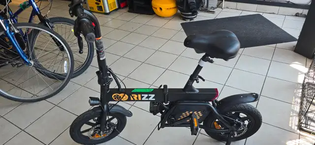Gyrocopters Rizz Foldable Electric Bike With Charger