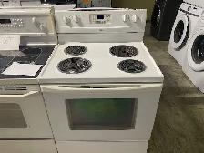 Cuisinière blanche ronds serpentins Whirlpool