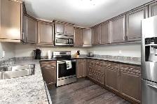 Premium Furnished Condo – Underground Heated Parking - Photo 3