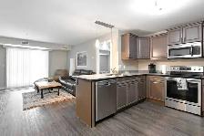 Premium Furnished Condo – Underground Heated Parking - Photo 4