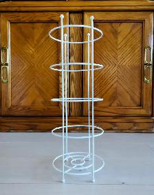 Toilet tissue roll storage holder
