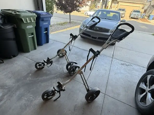 Two 3-Wheeled Golf Pull Carts