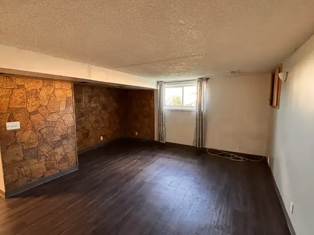 Legal Basement Suite with In-Suite Laundry & Utilities Included