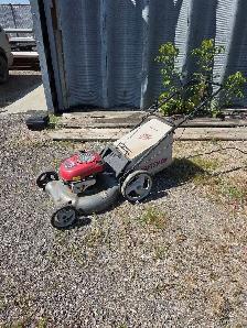 Lawnmower. In good working condition. Pull.