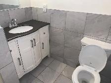 Bungalow for rent: DOWNSTAIRS/BASEMENT UNIT - Photo 6