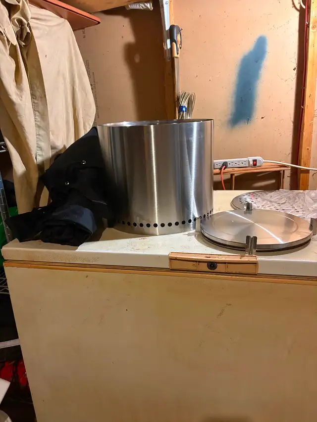Stainless steel portable fire pit.