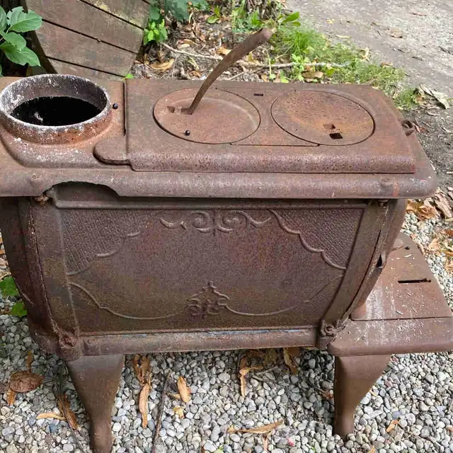 WOOD STOVE (cast iron)  $50