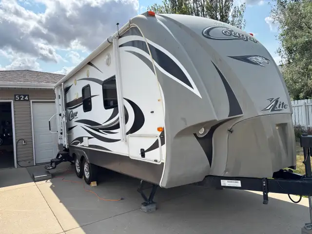 2014 Keystone lite Cougar bumper pull trailer
