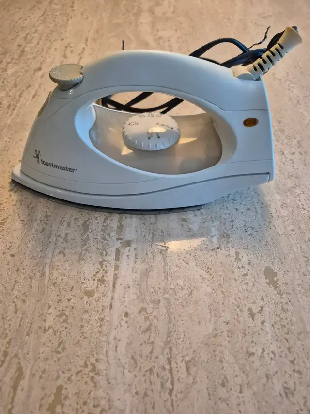 Fer à Repasser