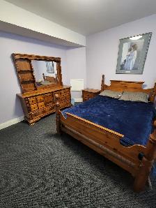 Basement suite with shared access for rent - Photo 3