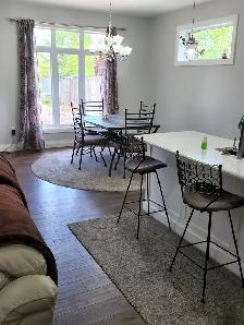 Basement suite with shared access for rent - Photo 9