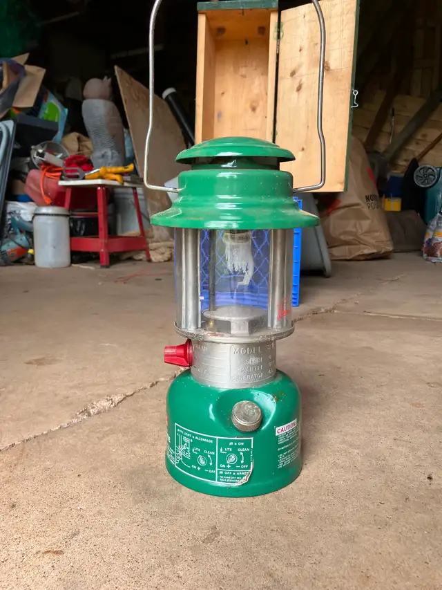 Vintage Coleman Lantern in wooden case.