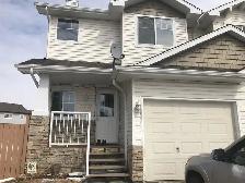 Rent duplex house with finished basement in Tamarack community