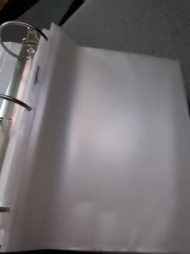3 Binders of Sheet Protectors