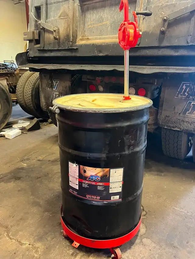 Dolly & Hand Pump with 55 Gallon Oil Drum
