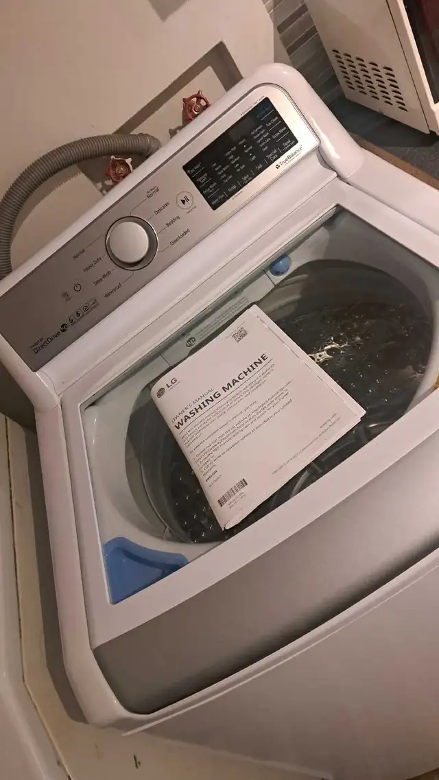 Laveuse LG ,  Grande capacité . COMME NEUVE