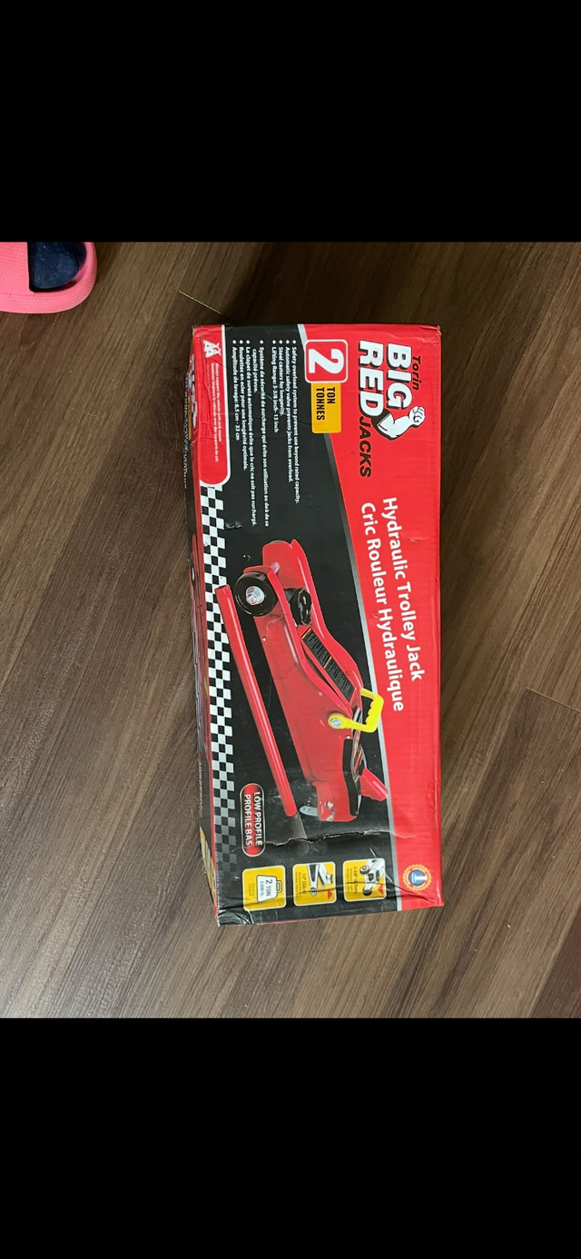Never Used car jack Big Red - hydraulic jack