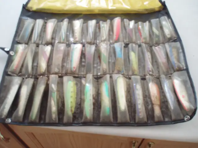 36  TROLLING SPOONS WITH ROLL OUT CASE  - FISHING GEAR