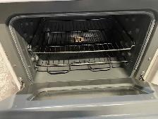 Cuisinière blanche ronds serpentins GE - Photo 3