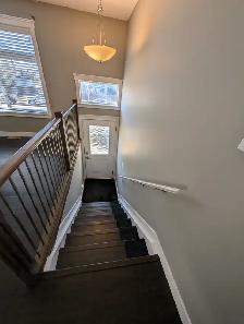Bright 2 bedroom, 2 bath home with garage and water included!