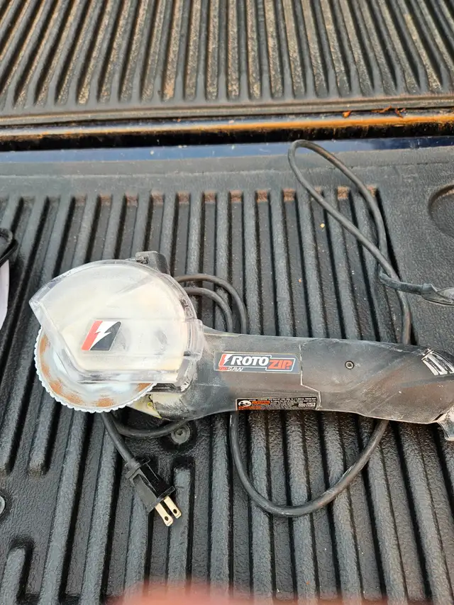 RotoZip Skill Saw, 4 inch blade, works great. $ 20
