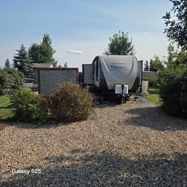 Permanent campsite, trailer & boat