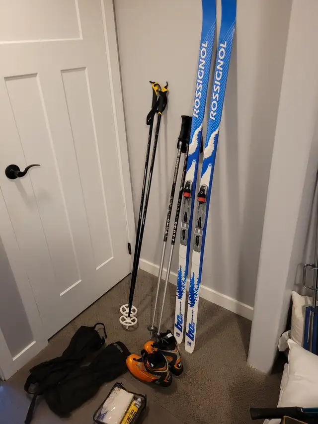 Womens cross country skis, boots, poles, gators and wax kit