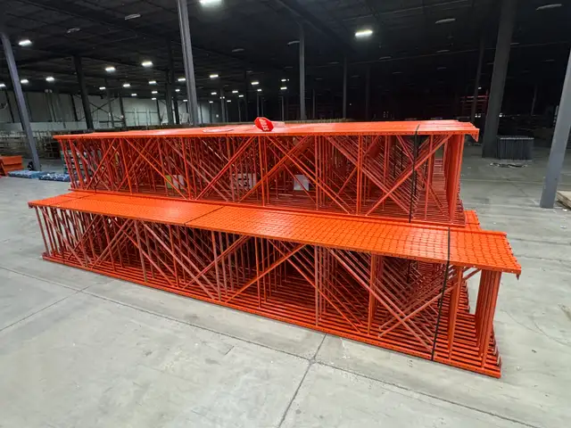 Used 48" deep pallet racking frames 6’ tall to 26’ tall.
