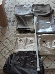 assorted drapes/curtains in various sizes and materials