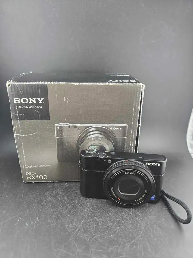 SONY CYBERSHOT DSC-RX100 DIGITAL CAMERA W/BOX