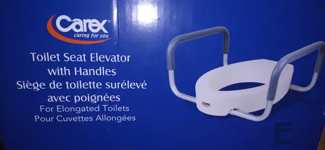 Toilet Seat Elongated Elevator style New in box with Handles