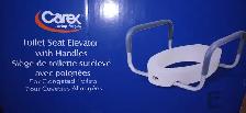 Toilet Seat Elongated Elevator style New in box with Handles