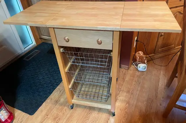 Kitchen Cart on rollers with expandable leafs and drawers