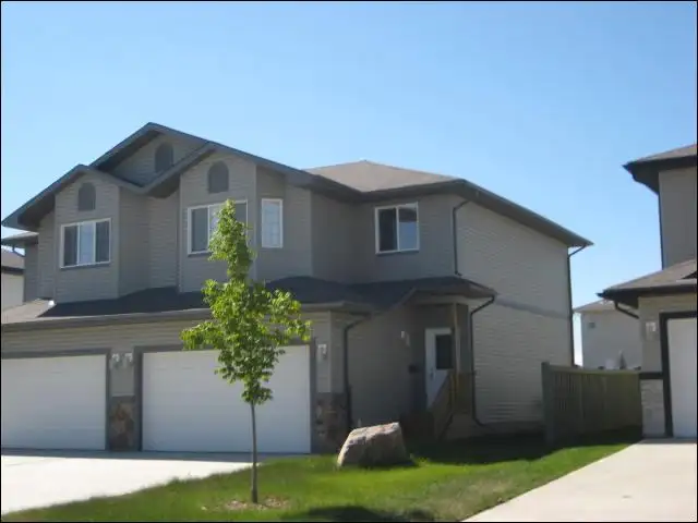 3 Bed 2.5 Bath Duplex with Double Attached Garage in Westpointe