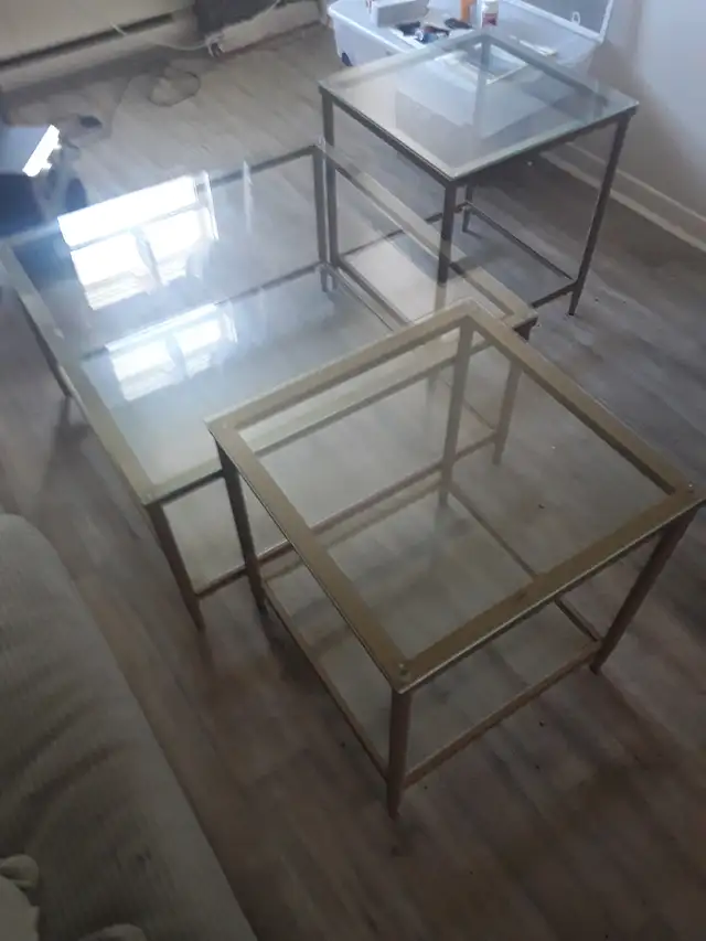 Glass top coffee table and end tables.