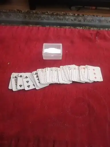 Tiny playing cards plus a game $5
